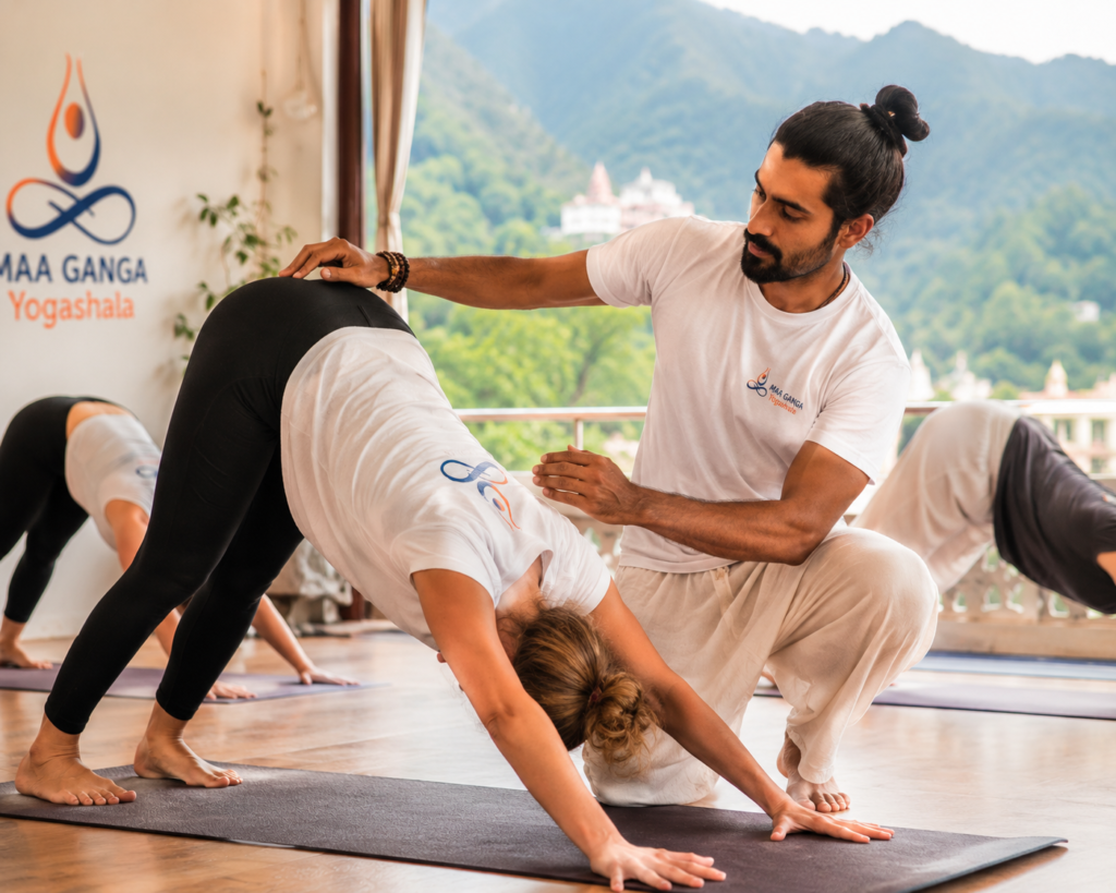 Alignment correction during the Maa Ganga Yogashala 100 hour course structure.